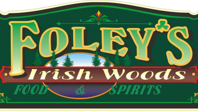 Logo of Foley Irish Woods & Spirits in green and gold.