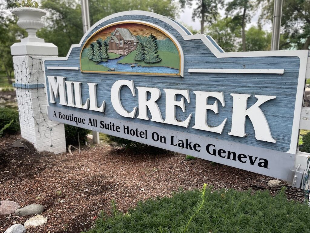 Entrance sign for Mill Creek apartment homes in Geneva.